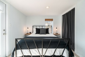 1 bedroom, desk, iron/ironing board, travel cot