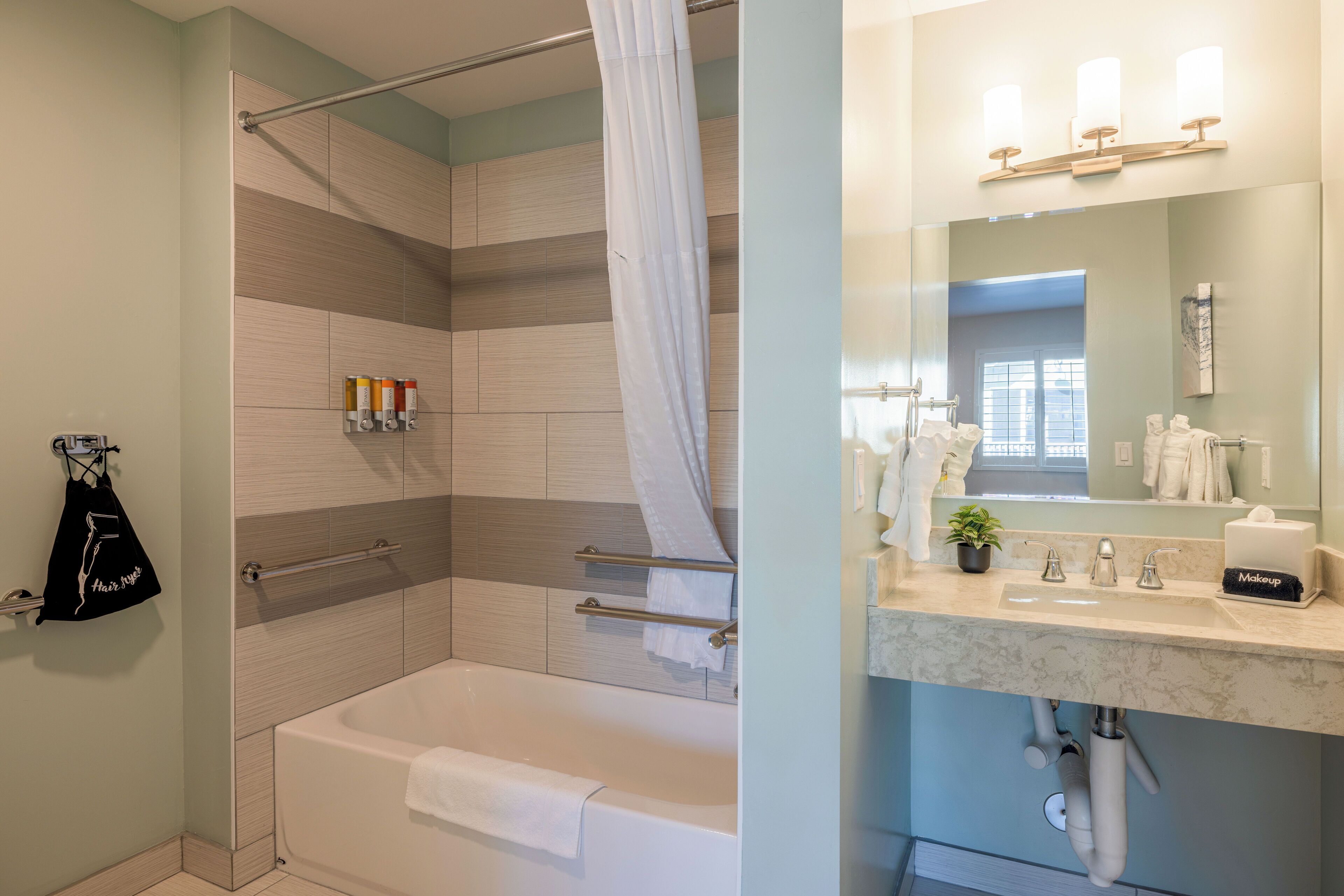 superior room, 2 queen beds, accessible bathtub | bathroom | hair dryer, towels, soap, shampoo