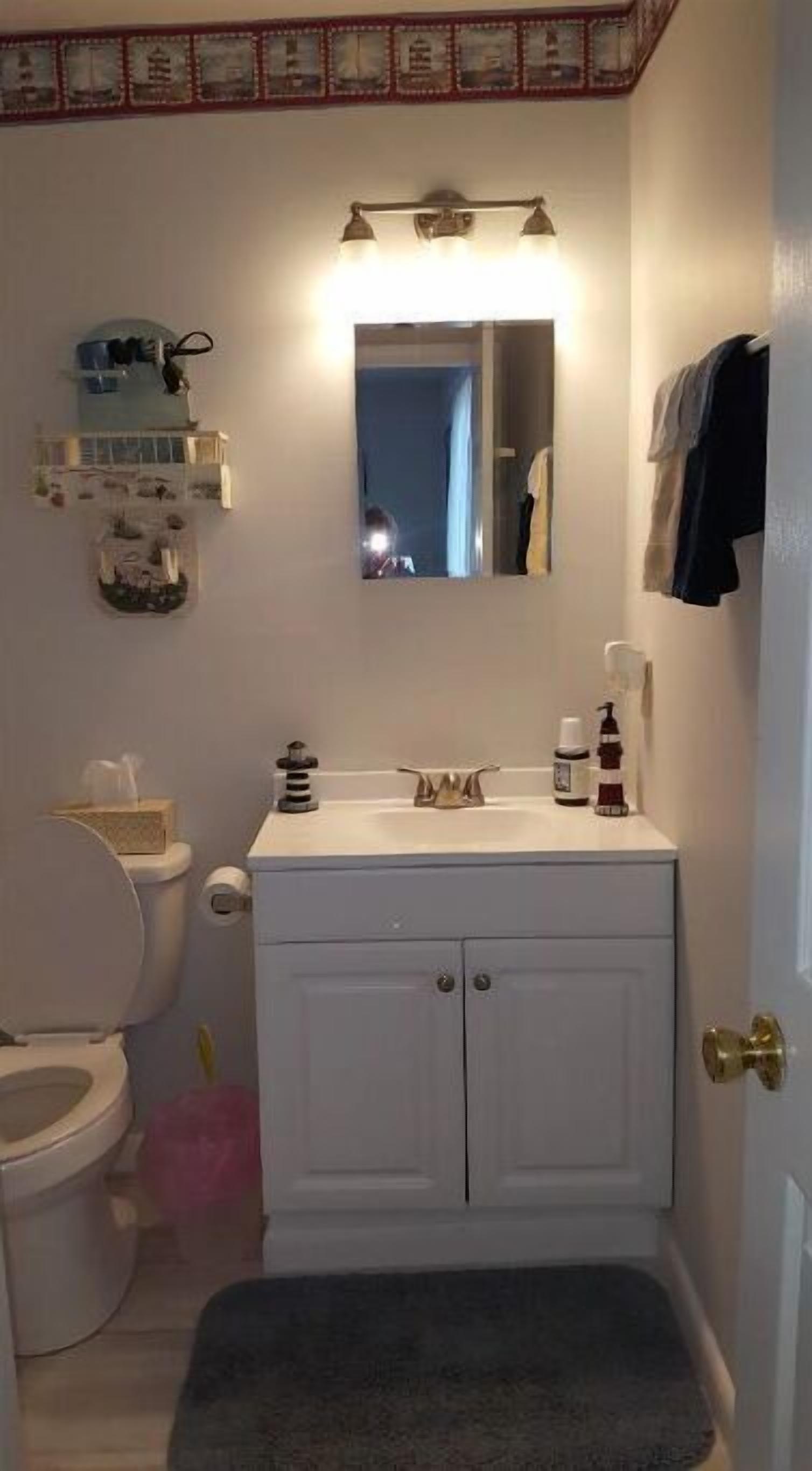 Combined shower/tub, hair dryer, towels, soap