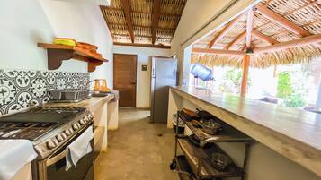 Fridge, microwave, stovetop, coffee/tea maker