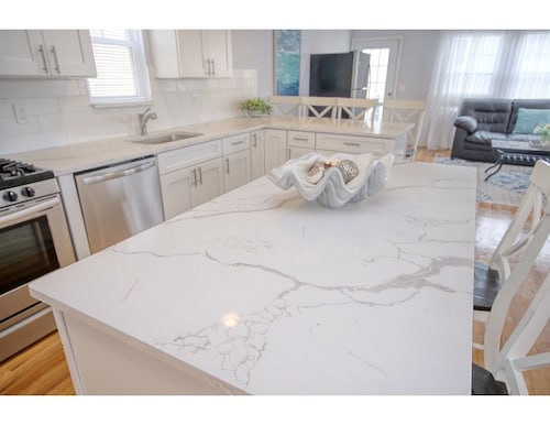 Beach house with room for everyone! 2 blocks to the beach with inground pool.