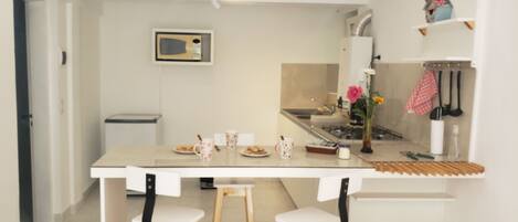 Fridge, microwave, electric kettle, toaster