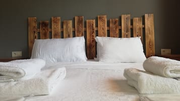 Apartamento família | Frigobar (abastecido com alguns itens grátis), individualmente decorados