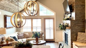 Smart TV, fireplace, books