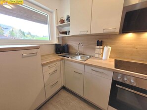 Fridge, microwave, oven, stovetop - Holiday home two-story and rustic (Bad Mitterndorf)