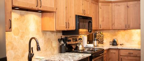 Condo, 2 Bedrooms | Private kitchen | Fridge, microwave, oven, coffee/tea maker