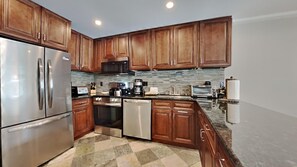 Condo, 2 Bedrooms | Private kitchen | Fridge, oven, coffee/tea maker, toaster