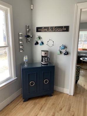 Enjoy a warm cup of coffee in the comfort of your room, where a coffee maker and cozy nook await.