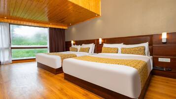 Desk, blackout curtains, soundproofing, rollaway beds