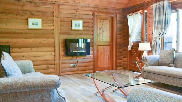 Lounge - An Amazing Cedar 3 Bedroom Lodge On The Lochside at Portsonachan (Dalmally)