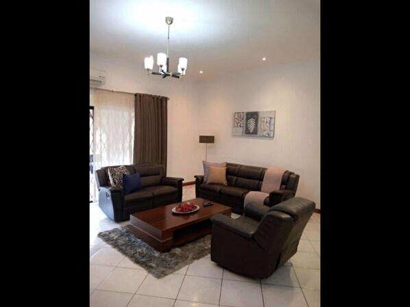 House, 3 Bedrooms, Smoking, Terrace | Living area | TV - 3 Bedrooms Exclusive House in Northmead (Lusaka)