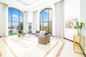 Deluxe Villa | Living area | 55-inch LCD TV with digital channels, TV - LUX Holiday Home - Frond E 1 (Dubai)