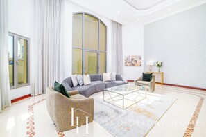 Deluxe Villa | Living area | 55-inch LCD TV with digital channels, TV - LUX Holiday Home - Frond E 1 (Dubai)
