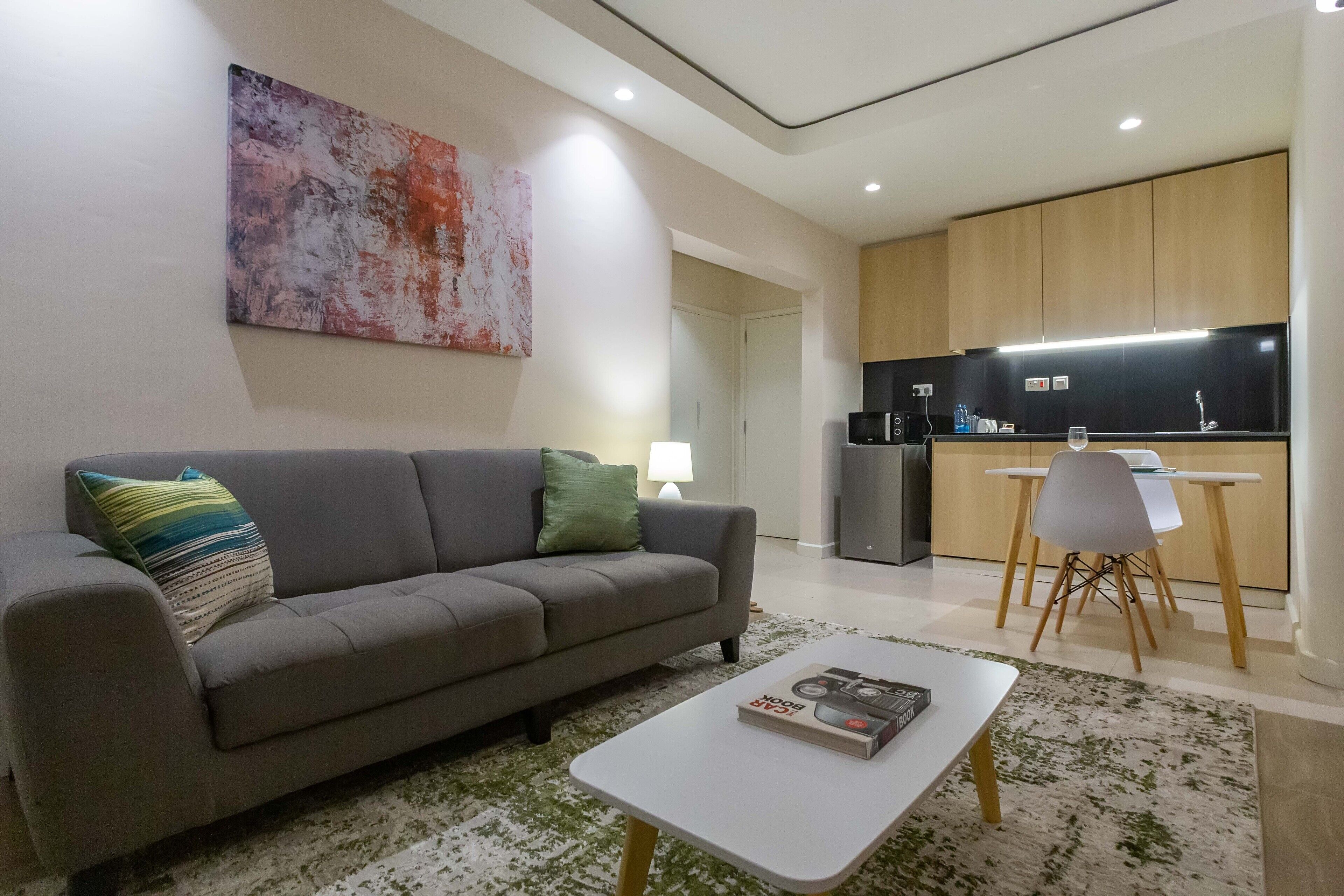 deluxe studio suite | laptop workspace, soundproofing, free wifi, bed sheets