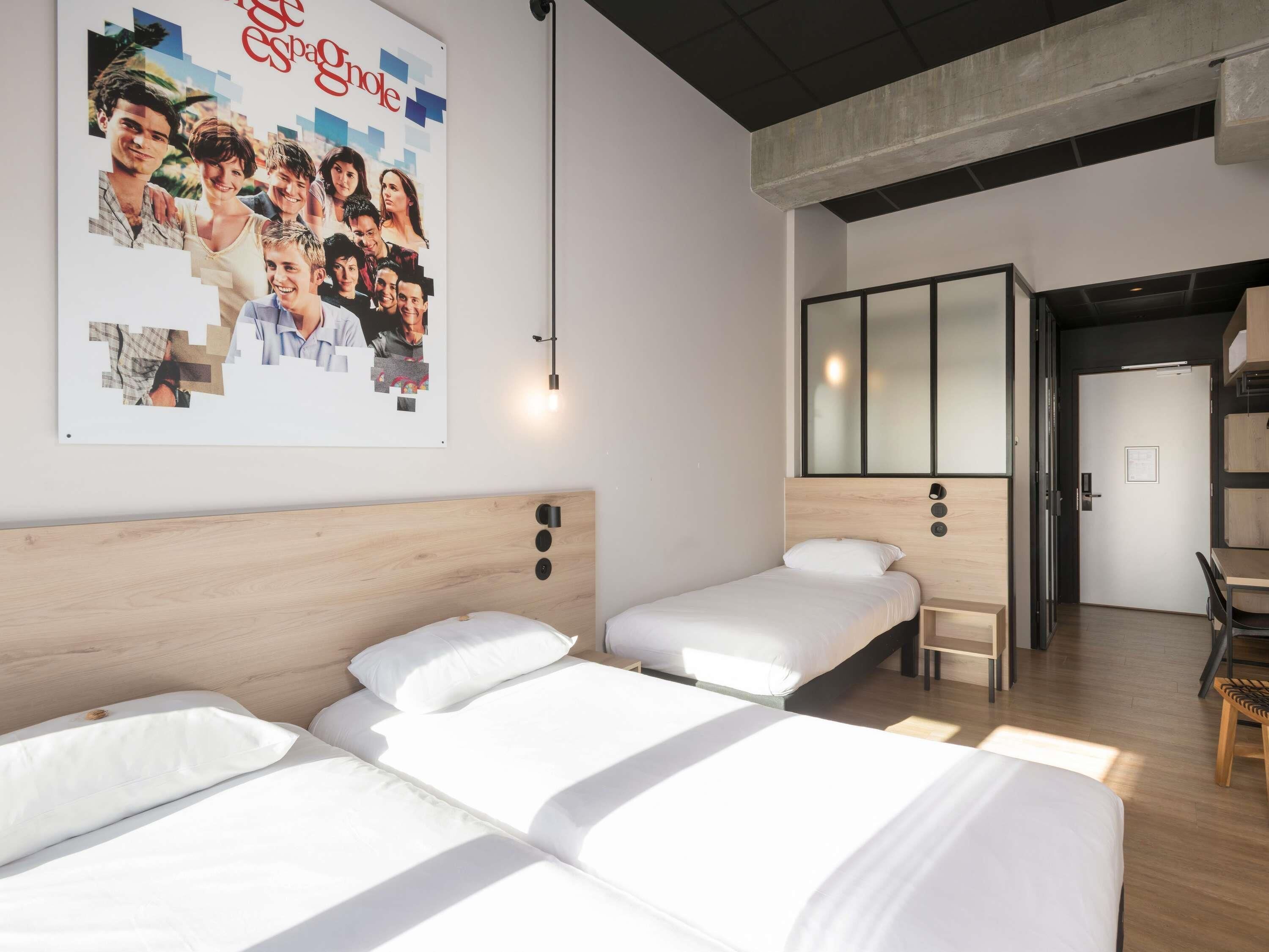 Standard Room, Multiple Beds | In-room safe, desk, soundproofing, iron/ironing board