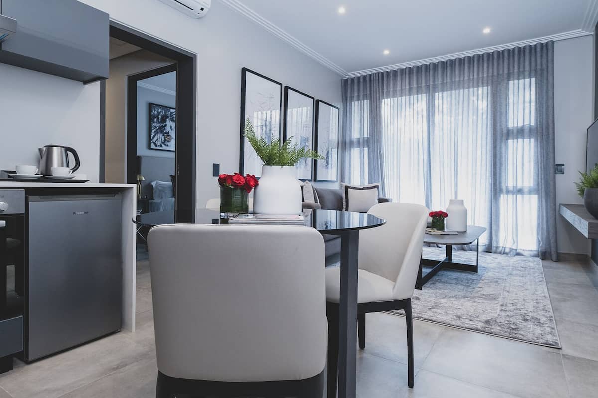 one bedroom apartment | living area | 43-inch lcd tv with satellite channels, tv