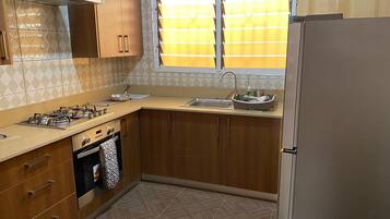 Apartment | Private kitchen | Fridge, microwave, oven, toaster