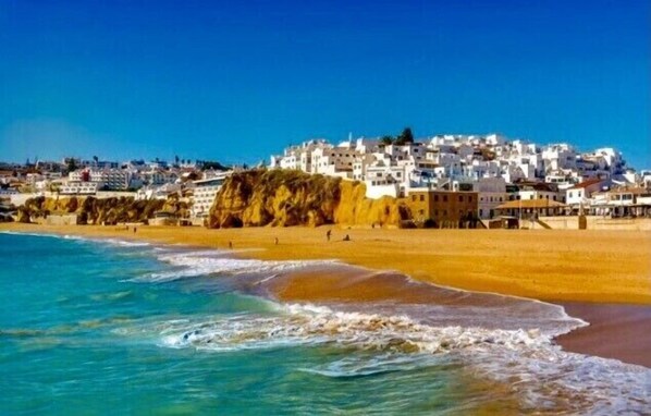 On the beach, beach towels