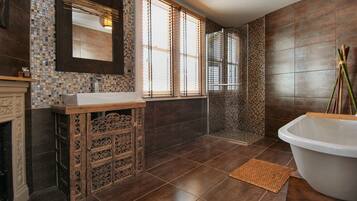 Bathtub, hair dryer, towels, soap