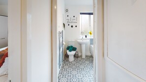 Regadera y secadora de cabello 