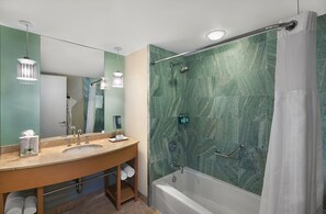 Bathtub, hair dryer, towels, soap