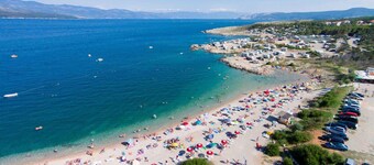 Holiday flat with air conditioning near the beach