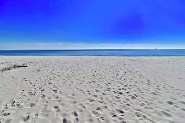 A la platja, gandules de platja i tovalloles de platja