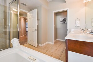 Combined shower/tub, hair dryer, towels, toilet paper