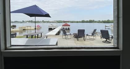 Lake front cottage recently remodeled w/ private dock and optional pontoon boat.