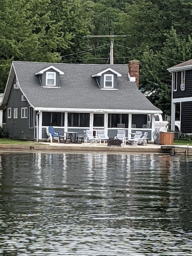 Lake front cottage recently remodeled w/ private dock and optional pontoon boat.