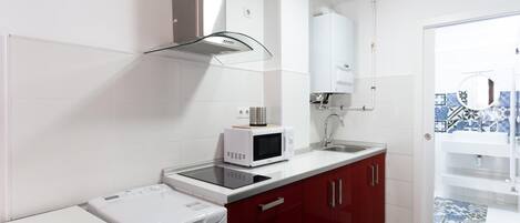 Microwave, coffee/tea maker, toaster, cookware/dishes/utensils