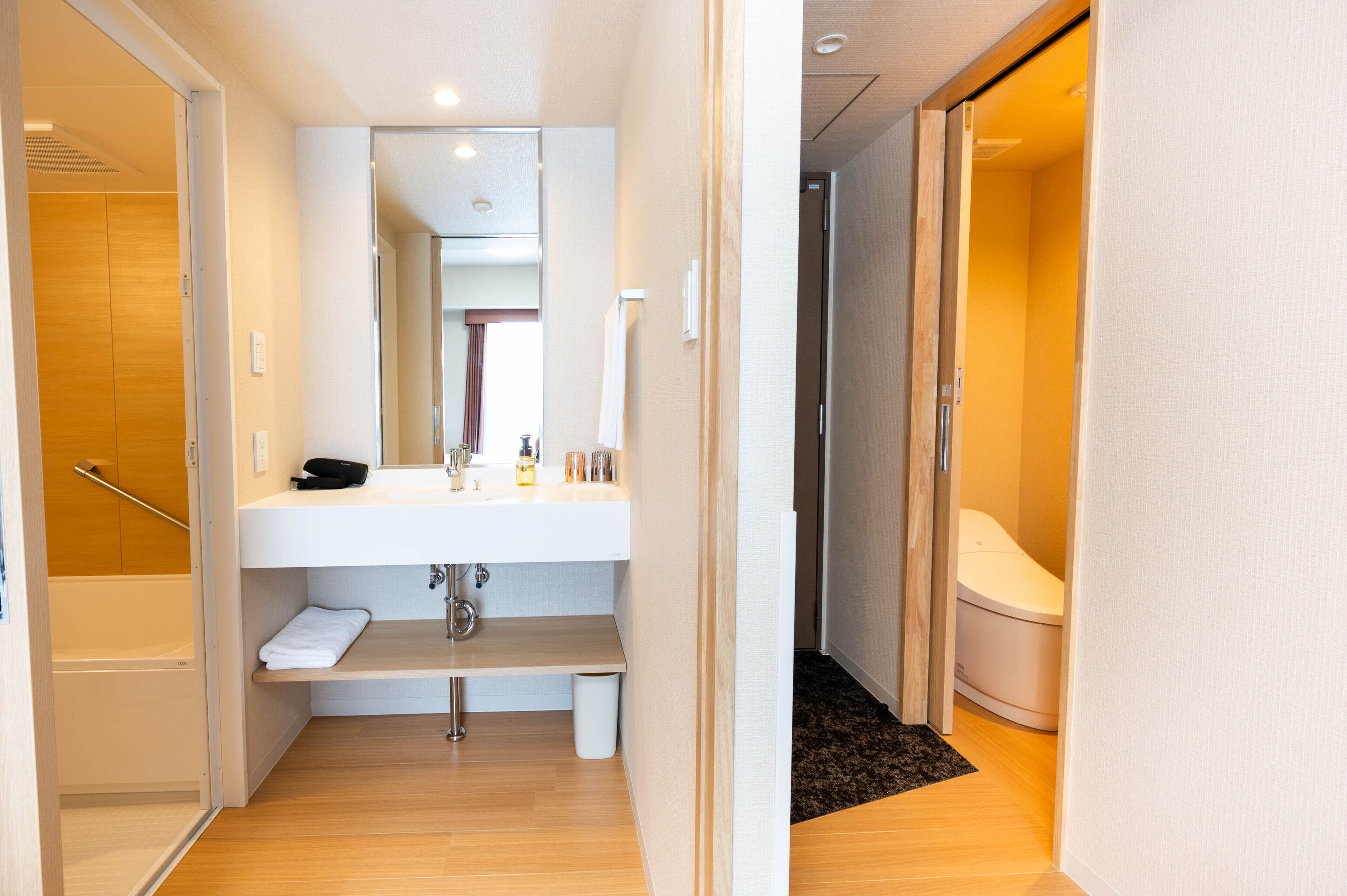 free toiletries, hair dryer, slippers, electronic bidet