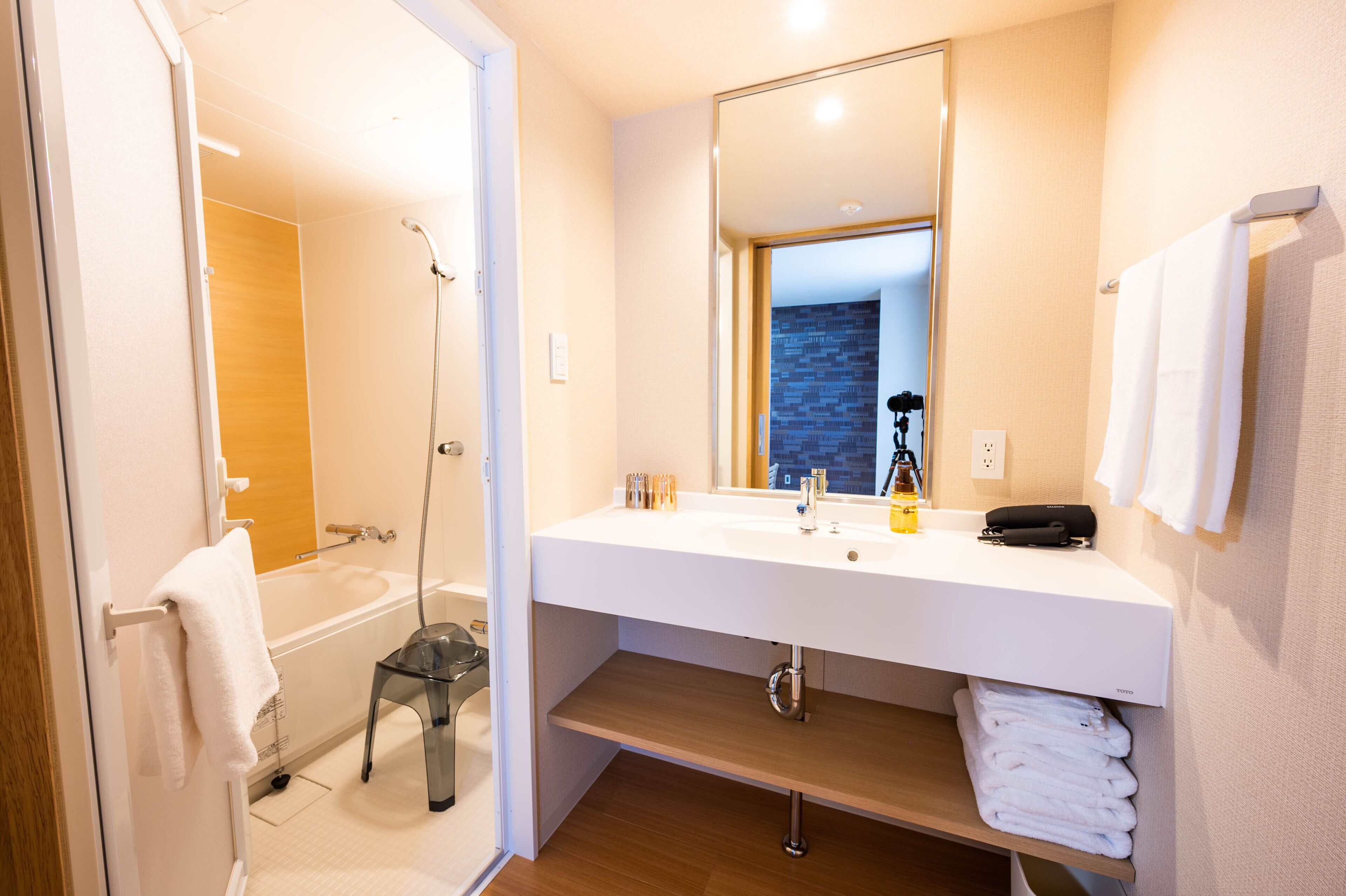 free toiletries, hair dryer, slippers, electronic bidet