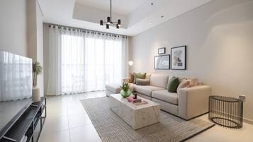 Superior Apartment, 2 Bedrooms, Courtyard View | Living area | 50-inch Smart TV with cable channels, TV