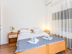 2 quartos, acesso à internet, roupa de cama