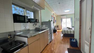 Fridge, microwave, stovetop, cookware/dishes/utensils