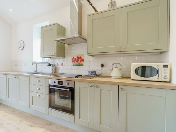 Oven, dishwasher, high chair, cookware/dishes/utensils