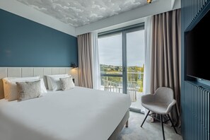 Habitación superior, 1 cama doble | Mobiliario individual, escritorio, espacio para trabajar con un portátil