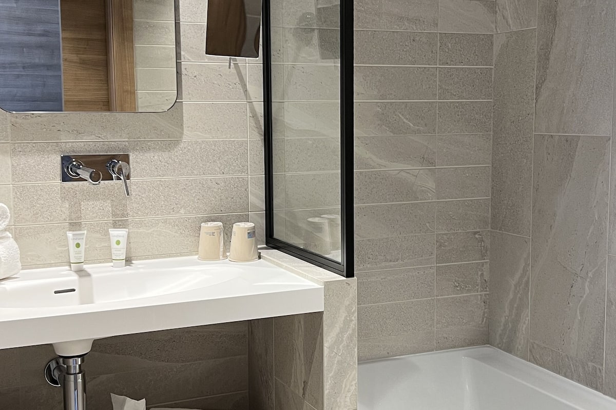 eco-friendly toiletries, hair dryer, towels