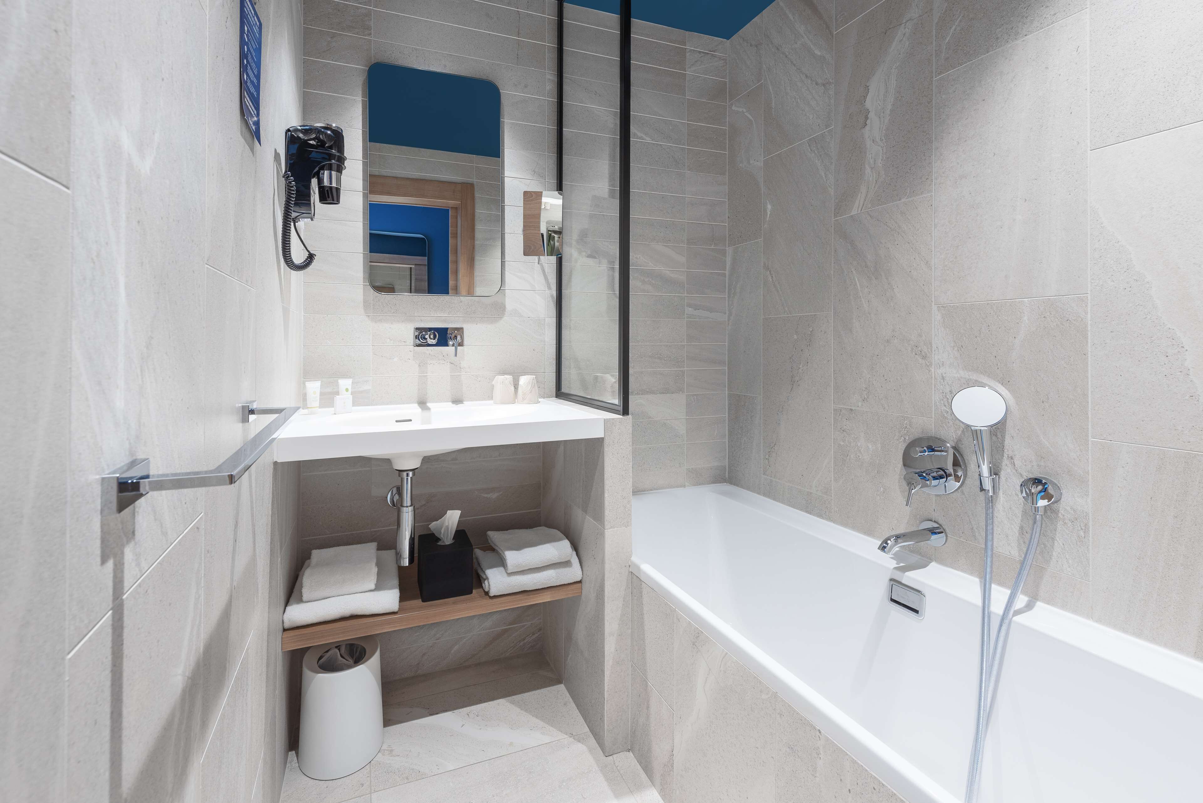 eco-friendly toiletries, hair dryer, towels