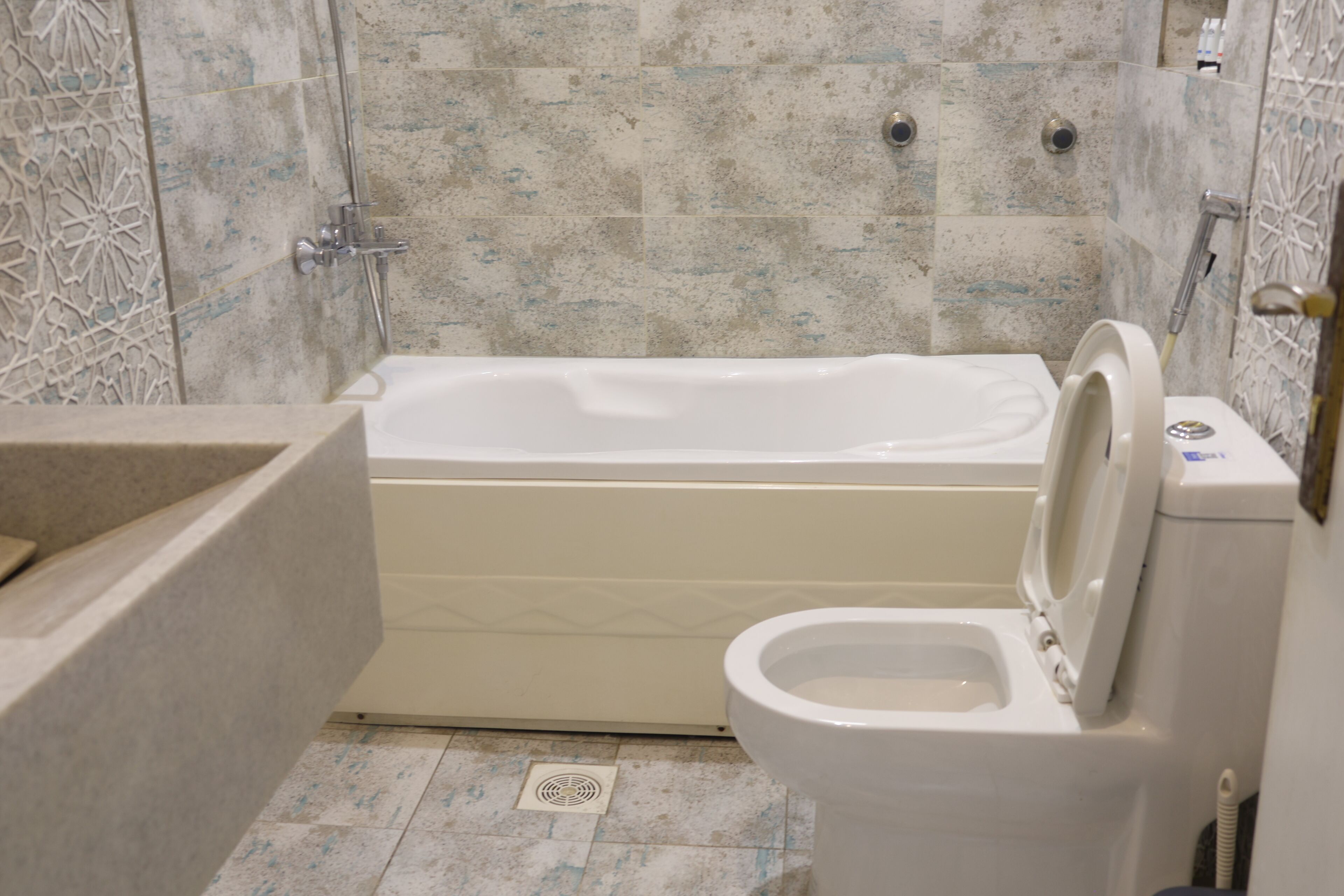 family apartment | bathroom | slippers, towels