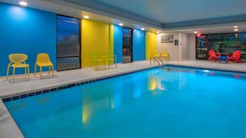 Indoor pool, open 7:00 AM to 10:00 PM, pool loungers