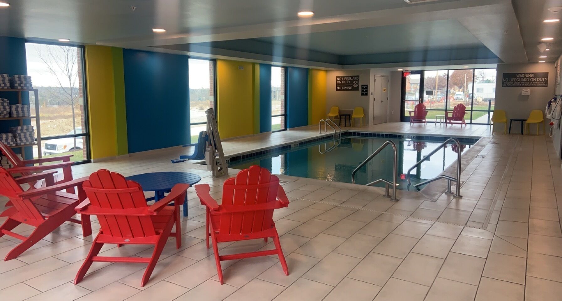 indoor pool, open 7:00 am to 10:00 pm, pool loungers