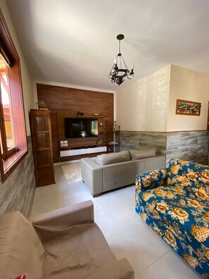 Smart TV, fireplace, foosball, books