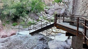 A rocky canyon with a metal bridge over a stream. - #1 Casita Wild Mustang at the Catwalk, 2 BdRm Casita (Catron County)