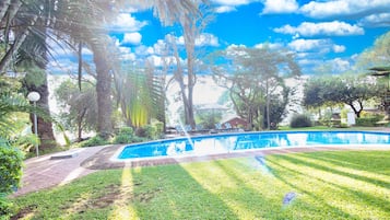 Outdoor pool, open 7:00 AM to 6:30 PM, sun loungers