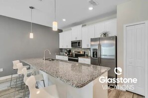 Fridge, microwave, oven, stovetop - 4BD/3BA Deluxe Townhome w/pool at Storey Lake (Kissimmee)