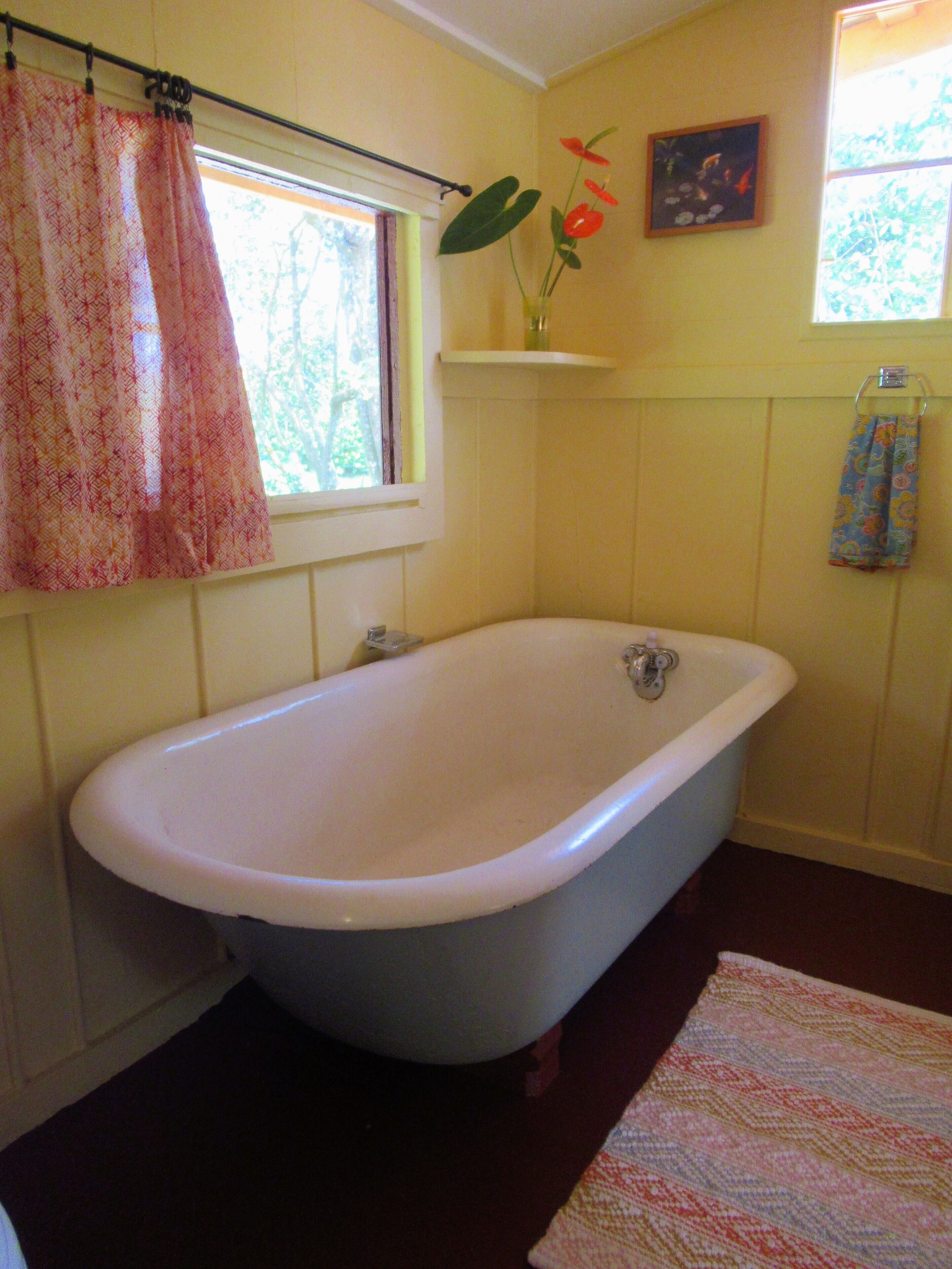 Bathtub, hair dryer, towels, soap