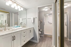 Combined shower/tub, hair dryer, towels, soap