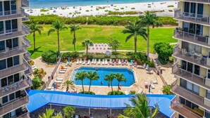 A hotel with a pool, beach view, and tennis court. - Welcome to the paradises 
Departure clean included. Adv. #034724w10370b (Fort Myers Beach)